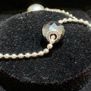 Pandora Essence bracelet and “Courage” charm